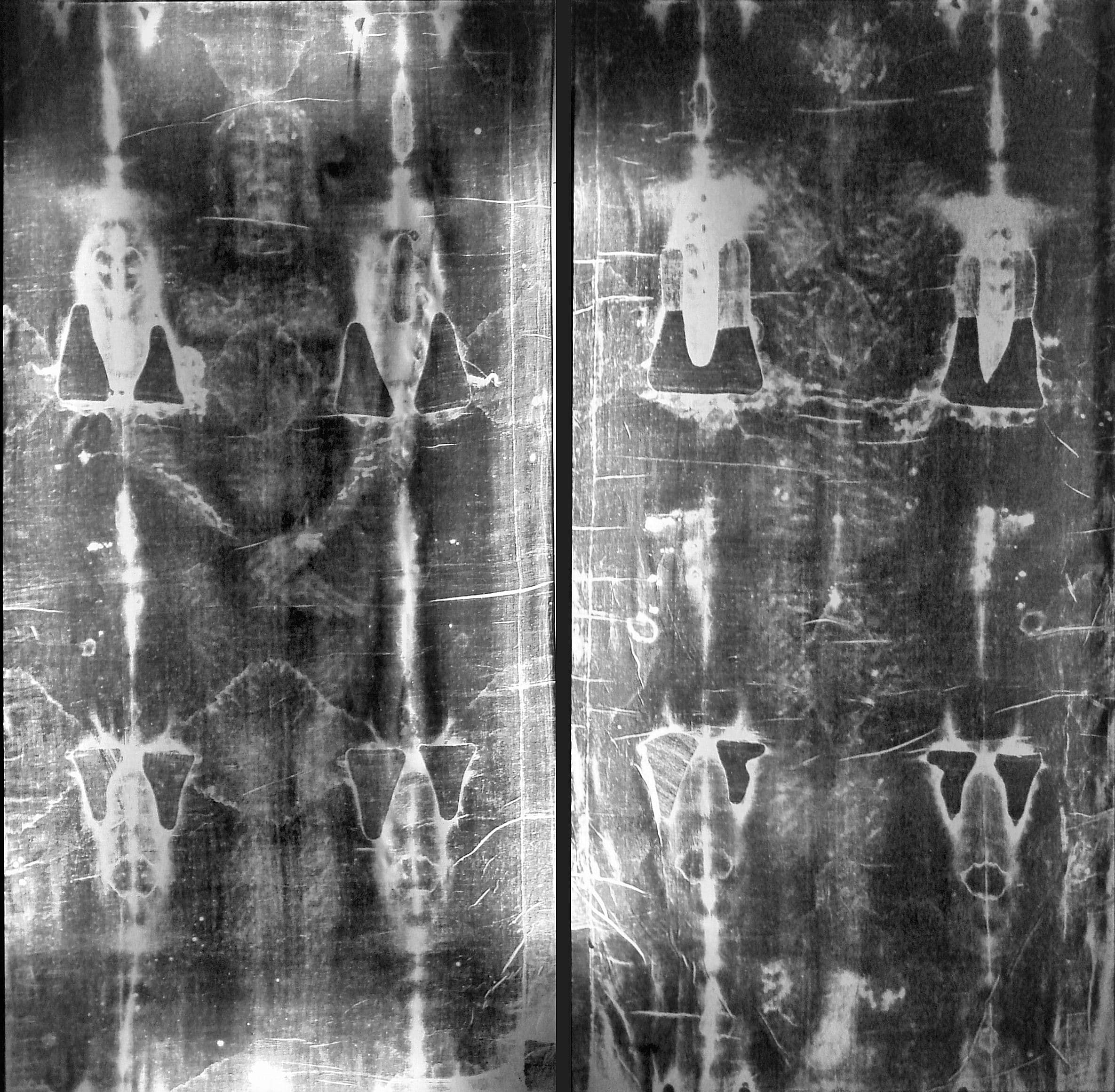 Full-length front-and-back photographic negative of the Shroud of Turin, showing the faint image of a crucified man — the form in which the body and face are most clearly visible.